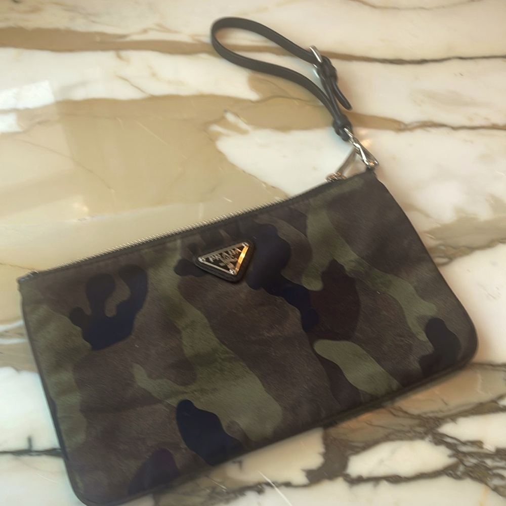 Prada wristlet. In new condition